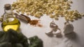 Close-up of typical Italian Apulian fresh pasta orecchiette on a table with broccoli, garlic, oil and chilli powder Royalty Free Stock Photo