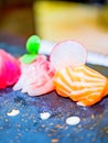 Close-up of a typical Japanese dish of sushimi with tuna salmon roll on a black background Royalty Free Stock Photo