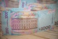 Close up 1000 Ukrainian money hryvnia on white background. Business flat lay with copy space for text. Crisis and problem of