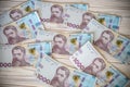 Close up 1000 Ukrainian money hryvnia on white background. Business flat lay with copy space for text. Crisis and problem of