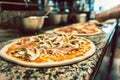 Close-up of unbaked pizza dough topped with mushrooms and prosciutto Royalty Free Stock Photo