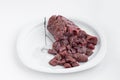 Uncooked,chopped beef meat on white plate Royalty Free Stock Photo