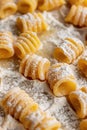 Close-up of uncooked gnocchi pasta on a wooden surface