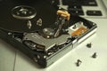 Close up of uncovered broken 2.5 inch hard drive with unreadable data. Royalty Free Stock Photo