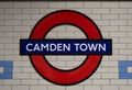 Close up of underground station roundel sign on the platform of Camden Town station, London, UK Royalty Free Stock Photo