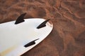 Close Up Of Underside Of Surfboard Lying On Sand