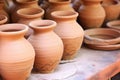 close-up of unfinished clay pots on pottery wheel