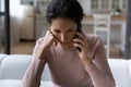 Close up unhappy woman talking on phone, hearing bad news Royalty Free Stock Photo