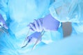 Close-up of unknown surgeons at work while operating at hospital. Health care and veterinary concept Royalty Free Stock Photo