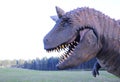 Close-up of unreal dinosaur against of landscape