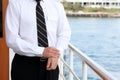 Close-up unrecognizable man male hands guy captain motorboat standing cruise cargo ship yacht elegant uniform tie