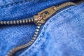 Close up of an unzipped blue jeans. Zip lock close up