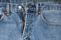 Closeup of Unzipped Blue Jeans