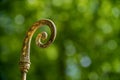 Close-up of the upper part of a bishops crozier