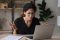 Close up upset businesswoman in glasses having problem with laptop