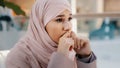 Close-up upset young woman gets bad news feels stressful anxiety frustrated muslim girl suffers from headache grabs head