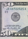 Close up on US dollar banknotes. U.S. Treasury Seal on US Dollar banknotes. Shooting by 1:1 Macro lense. I Royalty Free Stock Photo