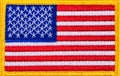 Close up of a USA Flag patch with yellow trim