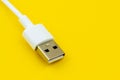 close up of usb cable on yellow background Royalty Free Stock Photo