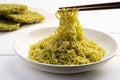 Close up use chopsticks clamp noodles,Boiled japanese style green noodles,Cooked