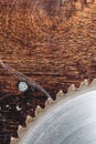 Close-up used blade circular saw on the background of the wooden table Verscak. Workshop for the production of wooden Royalty Free Stock Photo