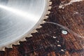 Close-up used blade circular saw on the background of the wooden table Verscak. Workshop for the production of wooden Royalty Free Stock Photo