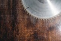 Close-up used blade circular saw on the background of the wooden table Verscak. Workshop for the production of wooden Royalty Free Stock Photo