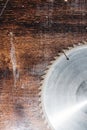 Close-up used blade circular saw on the background of the wooden table Verscak. Workshop for the production of wooden Royalty Free Stock Photo