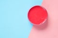 Close up of pink color petroleum jelly in a container
