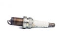Close up of used spark plugs with focus on the electrode with deposits Royalty Free Stock Photo