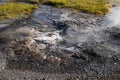 Close up of the Utu Geysir Geyser in Iceland, located at the Secret Lagoon hot spring near Fludir, Iceland