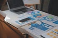 Close up ux developer and ui designer use augmented reality brainstorming about mobile app interface wireframe design on desk at Royalty Free Stock Photo
