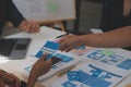 Close up ux developer and ui designer use augmented reality brainstorming about mobile app interface wireframe design on desk at Royalty Free Stock Photo