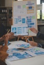 Close up ux developer and ui designer use augmented reality brainstorming about mobile app interface wireframe design on desk at Royalty Free Stock Photo