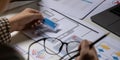A close-up of an ux ui developer and an ui designer working on a mockup icon interface for a mobile app. Royalty Free Stock Photo