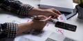 A close-up of an ux ui developer and an ui designer working on a mockup icon interface for a mobile app. Royalty Free Stock Photo