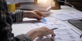 A close-up of an ux ui developer and an ui designer working on a mockup icon interface for a mobile app. Royalty Free Stock Photo
