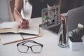 A close-up of an ux ui developer and an ui designer working on a mockup icon interface for a mobile app. Royalty Free Stock Photo