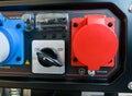 Close up of 230-400V switch of gas generator, fuses and sockets for power supply, connection Royalty Free Stock Photo