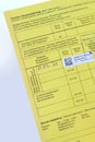 Close-up vaccination sticker in yellow blank emergency ID card of a patient in Germany, immune passport in German, immunization