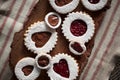 Close up of Valentine's cookies on tree bark