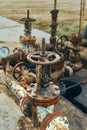 Close-Up Of Valve On Pipeline. Oil Or Gas Transportation With Gas Or Pipe Line Valves On Soil And Sunrise Background Royalty Free Stock Photo