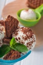 Close up of vanilla ice cream balls covered with chocolate biscuits Royalty Free Stock Photo