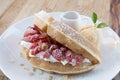 Close up of vanilla ice cream with waffle and fresh strawberry on wood table background Royalty Free Stock Photo