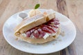 Close up of vanilla ice cream with waffle and fresh strawberry on wood table background Royalty Free Stock Photo