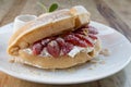 Close up of vanilla ice cream with waffle and fresh strawberry on wood table background Royalty Free Stock Photo