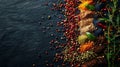 A close up of a variety of spices and herbs on black slate, AI