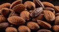 Pile of Brown Almonds Nuts with Detailed Texture Close-up in Studio Shot Royalty Free Stock Photo