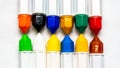 Close-Up of various colored paint tubes against isolated white background Royalty Free Stock Photo