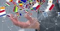 Close-up of various flags over businessman`s hand Royalty Free Stock Photo